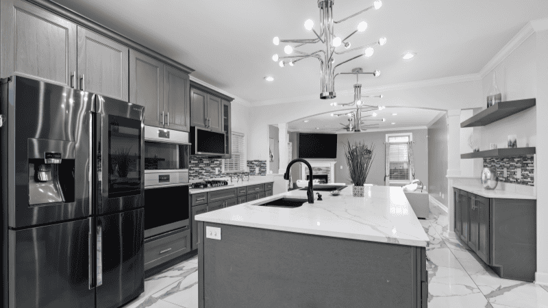 Modern kitchen decorated with a variety of warm white lights
