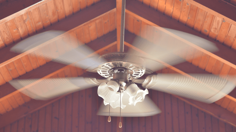 Consider room size, style, energy efficiency, and functionality before choosing chandelier fan