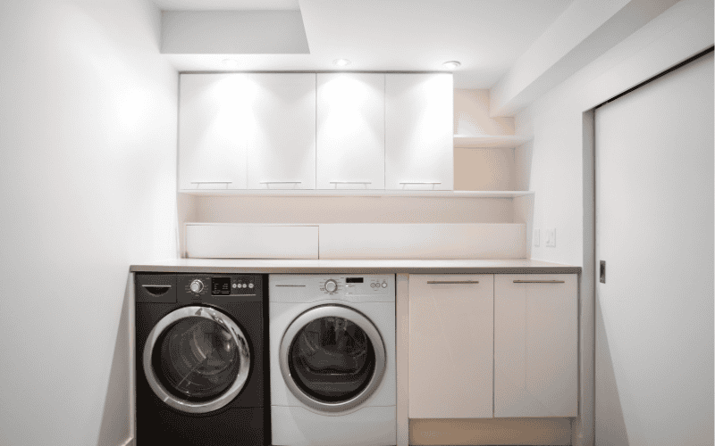 ceiling light makes the laundry room bright.