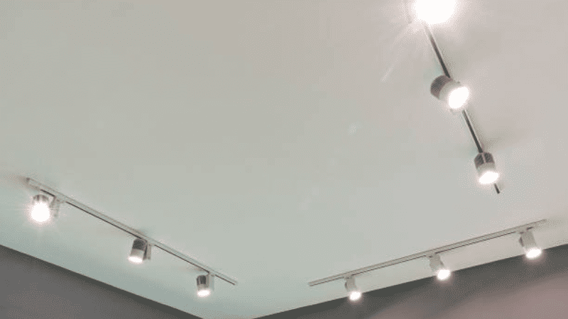 Magnetic track light systems installed in a room.