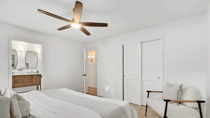The bedroom with a main tone of white has been matched
White ceiling fan.