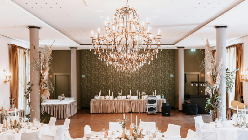 A luxury chandelier shining in a conference room